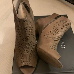 These are some boots to your ankle.beautiful brown color size 9 Vince camuto